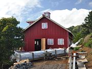 First Coat on Barn Wet and Red, March 14, 2010