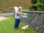 Eric Feeding a Maluhia Chicken