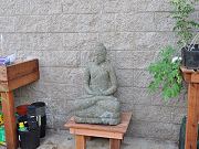 Carved Stone Buddha in Greenhouse, April 29, 2010