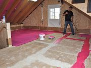 Rolling Waterproof Membrane on Upstairs Floor, June 14, 2010