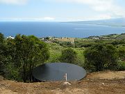 20,000 Gallon Water Tank with Superferry in Background