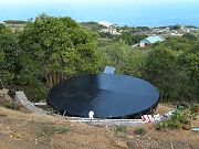 Tank with Retaining Wall and Solar Panels